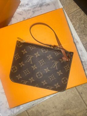 Louis Vuitton wristlet monogram new